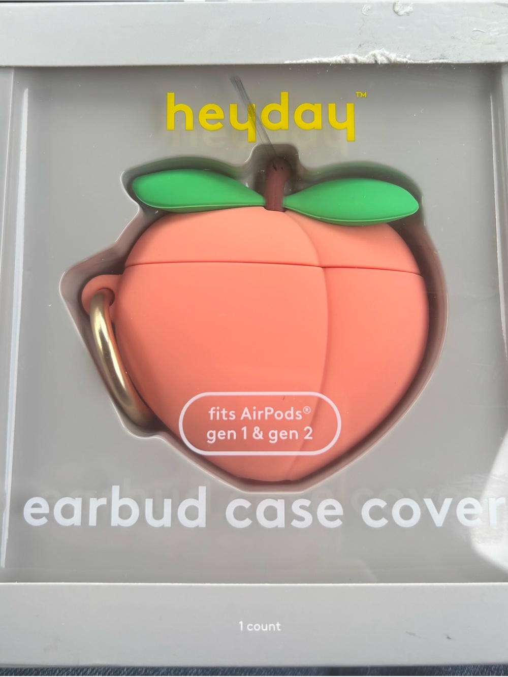 heyday Peach-Shaped Earbud Case Cover - Coral with Green Leaves